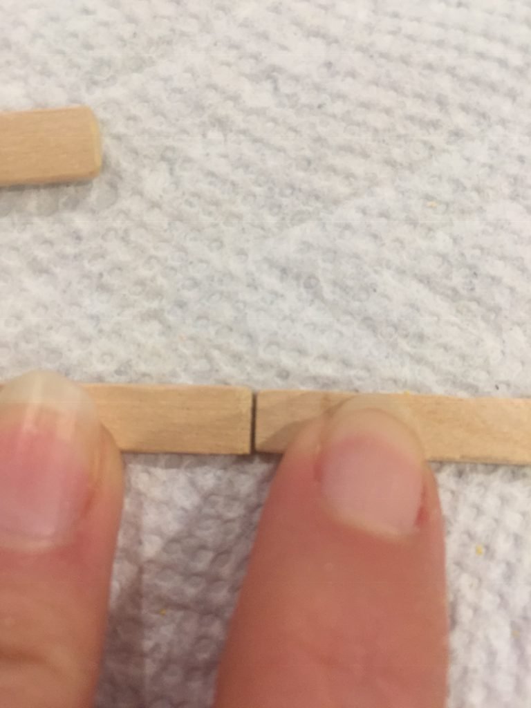 A picture of the sanded balsa wood strips forming the wood floor (sort of)