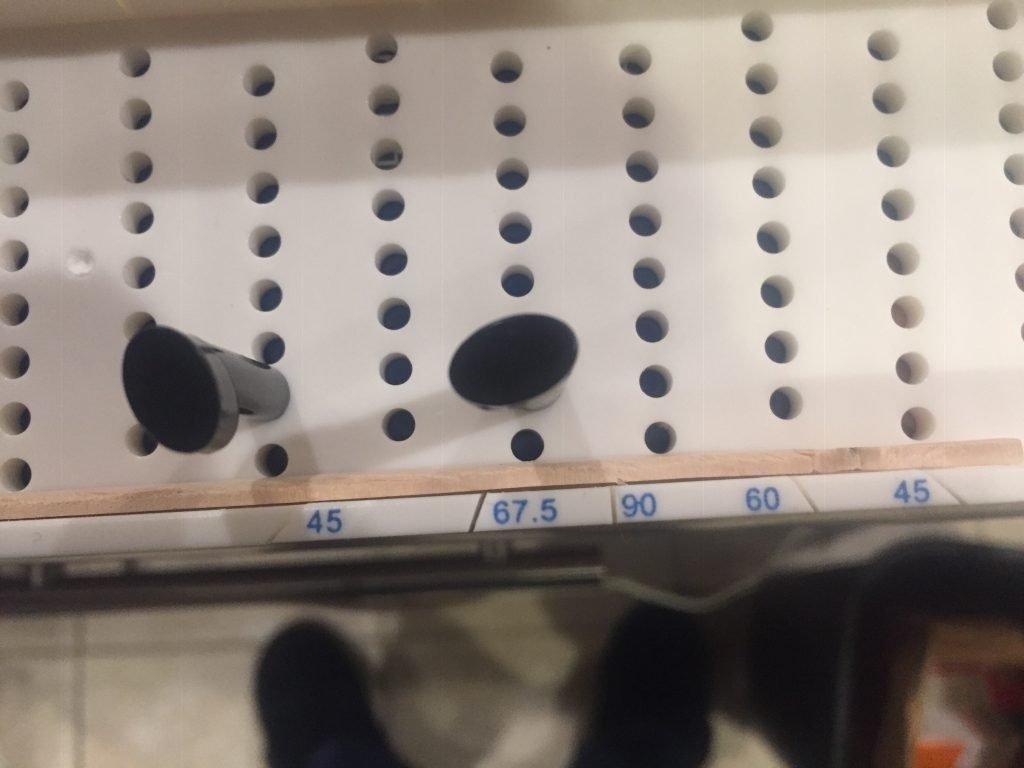A picture of the balsa wood strip flipped on it's side in the miter box